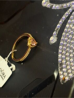 Pandora Gold Tone Ring with Pink Heart Stone and Pavé Band